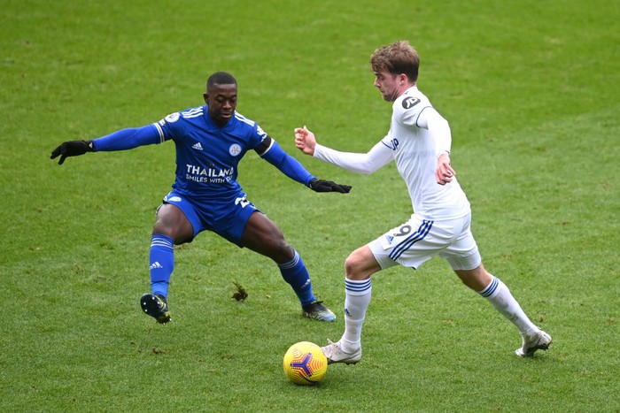 LEICESTER, ENGLAND - JANUARY 31: Patrick Bamford of Leeds United is challenged by Namplayas Mendy of Leicester City during the Premier League match between Leicester City and Leeds United at The King Power Stadium on January 31, 2021 in Leicester, England. Sporting stadiums around the UK remain under strict restrictions due to the Coronavirus Pandemic as Government social distancing laws prohibit fans inside venues resulting in games being played behind closed doors. (Photo by Michael Regan/Getty Images)