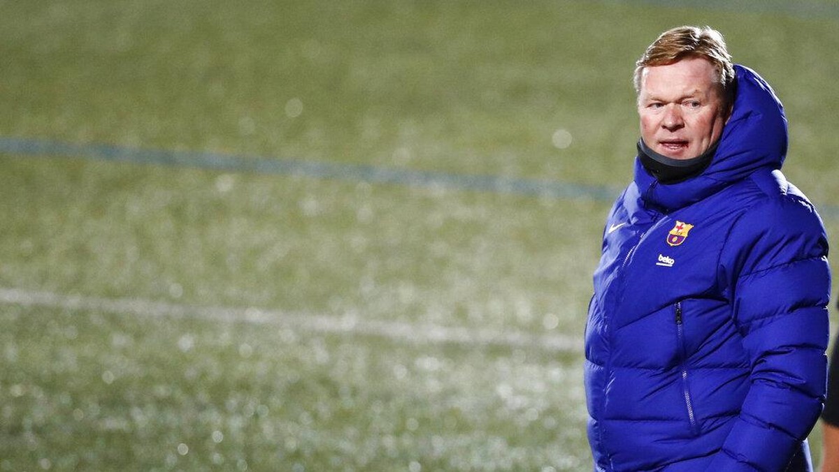 Ronald Koeman bahas masalah di Barcelona dengan Joan Laporta. (Foto: AP/Joan Monfort)