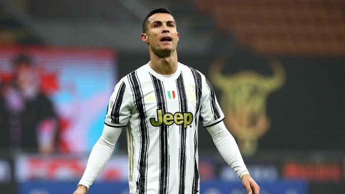 MILAN, ITALY - FEBRUARY 02: Cristiano Ronaldo of Juventus looks on during the Coppa Italia semi-final match between FC Internazionale and Juventus at Stadio Giuseppe Meazza on February 02, 2021 in Milan, Italy. Sporting stadiums around Italy remain under strict restrictions due to the Coronavirus Pandemic as Government social distancing laws prohibit fans inside venues resulting in games being played behind closed doors. (Photo by Marco Luzzani/Getty Images)