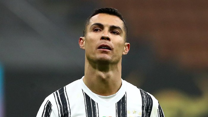 MILAN, ITALY - FEBRUARY 02: Cristiano Ronaldo of Juventus looks on during the Coppa Italia semi-final match between FC Internazionale and Juventus at Stadio Giuseppe Meazza on February 02, 2021 in Milan, Italy. Sporting stadiums around Italy remain under strict restrictions due to the Coronavirus Pandemic as Government social distancing laws prohibit fans inside venues resulting in games being played behind closed doors. (Photo by Marco Luzzani/Getty Images)