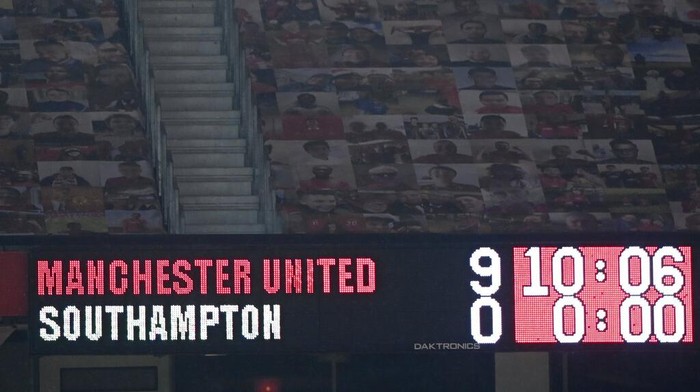 The scoreboard displays the final score after the English Premier League soccer match between Manchester United and Southampton, at the Old Trafford stadium in Manchester, England, Tuesday, Feb. 2, 2021. (Laurence Griffiths/Pool via AP)