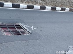Penutup Gorong-gorong Tak Rata di Jl Gatsu Arah Tendean Mulai Diperbaiki
