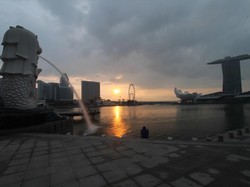 Berburu Sunrise dan Sunset Menawan di Negeri Singa
