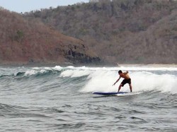 Berselancar Menaklukan Ombak Pantai Gerupuk, NTB