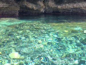 Pantai dengan Air Laut Bagai Cermin di Gorontalo