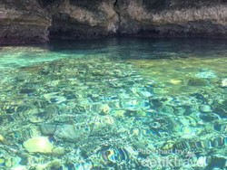 Pantai dengan Air Laut Bagai Cermin di Gorontalo