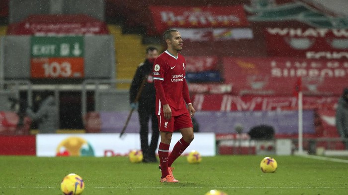 Liverpools Thiago leaves the pitch at the end of the English Premier League soccer match between Liverpool and Brighton at Anfield stadium, in Liverpool, England, Wednesday, Feb. 3, 2021. Brighton won 1-0. (Clive Brunskill/Pool via AP)