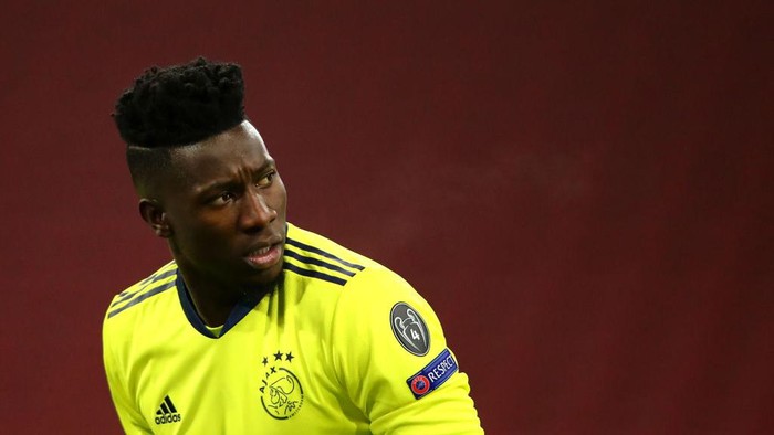 AMSTERDAM, NETHERLANDS - DECEMBER 09: Goalkeeper, Andre Onana of Ajax looks on during the UEFA Champions League Group D stage match between Ajax Amsterdam and Atalanta BC at Johan Cruijff Arena on December 09, 2020 in Amsterdam, Netherlands. Sporting stadiums around Netherlands remain under strict restrictions due to the Coronavirus Pandemic as Government social distancing laws prohibit fans inside venues resulting in games being played behind closed doors. (Photo by Dean Mouhtaropoulos/Getty Images)