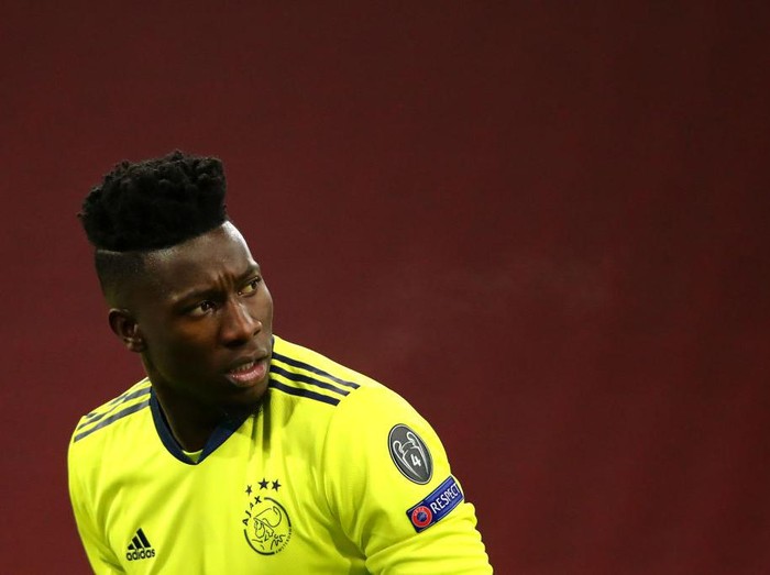 AMSTERDAM, NETHERLANDS - DECEMBER 09: Goalkeeper, Andre Onana of Ajax looks on during the UEFA Champions League Group D stage match between Ajax Amsterdam and Atalanta BC at Johan Cruijff Arena on December 09, 2020 in Amsterdam, Netherlands. Sporting stadiums around Netherlands remain under strict restrictions due to the Coronavirus Pandemic as Government social distancing laws prohibit fans inside venues resulting in games being played behind closed doors. (Photo by Dean Mouhtaropoulos/Getty Images)
