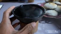 Menyesap Kopi dari Daun