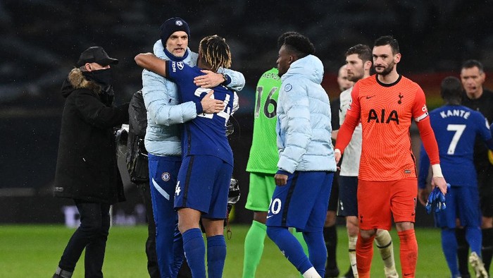 LONDON, ENGLAND - FEBRUARY 04: Thomas Tuchel, Manager of Chelsea embraces Reece James of Chelsea following the Premier League match between Tottenham Hotspur and Chelsea at Tottenham Hotspur Stadium on February 04, 2021 in London, England. Sporting stadiums around the UK remain under strict restrictions due to the Coronavirus Pandemic as Government social distancing laws prohibit fans inside venues resulting in games being played behind closed doors. (Photo by Neil Hall - Pool/Getty Images)