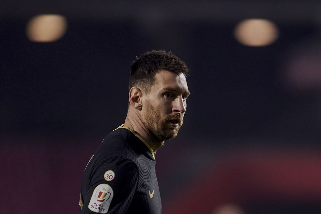 Barcelona's Lionel Messi looks on during a Spanish Copa del Rey quarter finals soccer match between Granada and FC Barcelona at the Los Carmenes stadium in Granada, Spain, Wednesday, Feb. 3, 2021. (AP Photo)