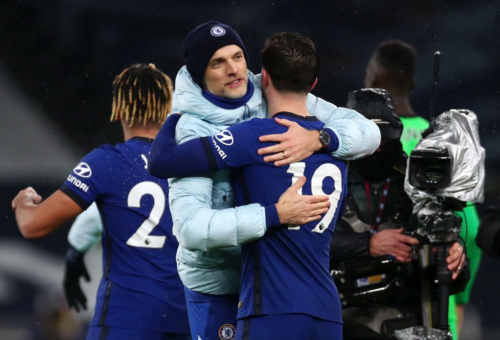 LONDON, ENGLAND - FEBRUARY 04: Thomas Tuchel, Manager of Chelsea embraces Mason Mount of Chelsea following the Premier League match between Tottenham Hotspur and Chelsea at Tottenham Hotspur Stadium on February 04, 2021 in London, England. Sporting stadiums around the UK remain under strict restrictions due to the Coronavirus Pandemic as Government social distancing laws prohibit fans inside venues resulting in games being played behind closed doors. (Photo by Clive Rose/Getty Images)