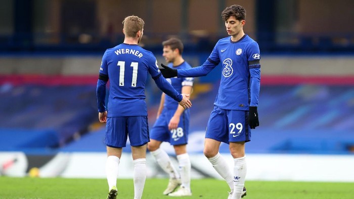 LONDON, ENGLAND - JANUARY 31: Kai Havertz of Chelsea interacts with team mate Timo Werner following the Premier League match between Chelsea and Burnley at Stamford Bridge on January 31, 2021 in London, England. Sporting stadiums around the UK remain under strict restrictions due to the Coronavirus Pandemic as Government social distancing laws prohibit fans inside venues resulting in games being played behind closed doors. (Photo by Julian Finney/Getty Images)