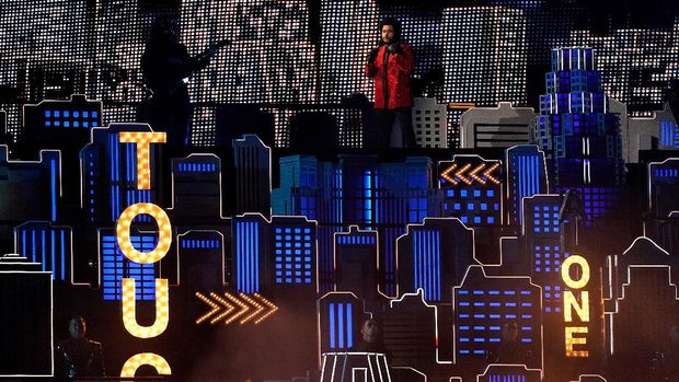 The Weeknd performs during halftime of the NFL Super Bowl 55 football game between during the halftime show of the NFL Super Bowl 55 football game between the Kansas City Chiefs and Tampa Bay Buccaneers, Sunday, Feb. 7, 2021, in Tampa, Fla. (AP Photo/David J. Phillip)