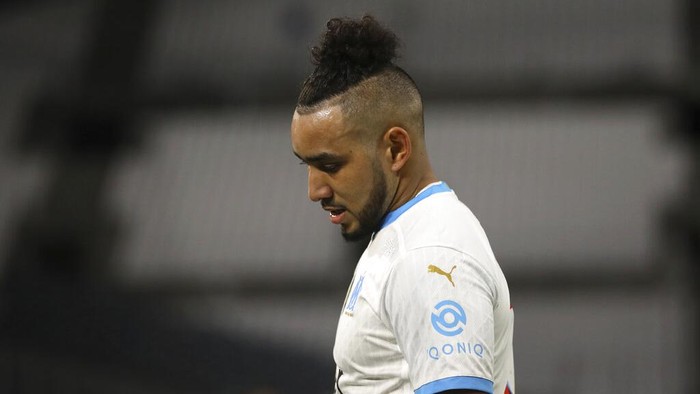 Marseilles Dimitri Payet gestures during the French League One soccer match between Olympique de Marseille and Paris Saint-Germain at the Velodrome stadium in Marseille, southern France, Sunday, Feb. 7, 2021. (AP Photo/Daniel Cole)