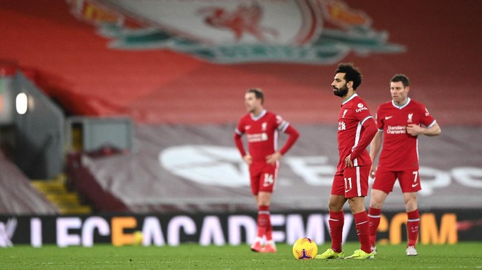 LIVERPOOL, ENGLAND - FEBRUARY 07: Mohamed Salah of Liverpool looks dejected after Manchester Citys fourth goal scored by Raheem Sterling (Not pictured) during the Premier League match between Liverpool and Manchester City at Anfield on February 07, 2021 in Liverpool, England. Sporting stadiums around the UK remain under strict restrictions due to the Coronavirus Pandemic as Government social distancing laws prohibit fans inside venues resulting in games being played behind closed doors. (Photo by Laurence Griffiths/Getty Images)