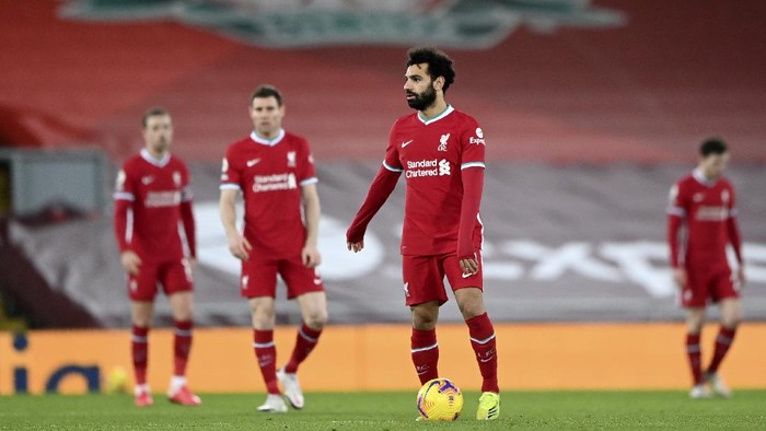 Liverpools Mohamed Salah, center, reacts after Manchester Citys Ilkay Gundogan scored his sides second goal during the English Premier League soccer match between Liverpool and Manchester City at Anfield Stadium, Liverpool, England, Sunday, Feb. 7, 2021. (Laurence Griffiths/Pool via AP)