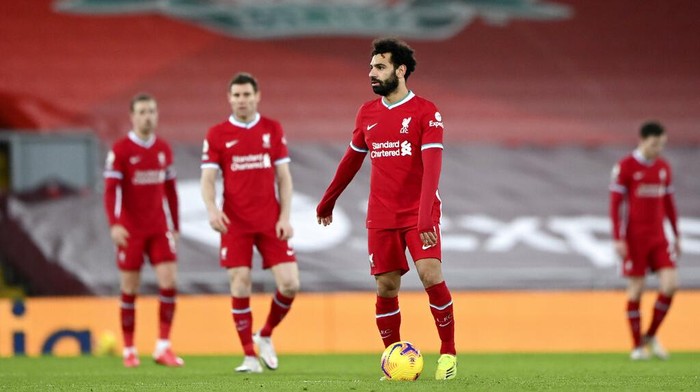 Liverpools Mohamed Salah, center, reacts after Manchester Citys Ilkay Gundogan scored his sides second goal during the English Premier League soccer match between Liverpool and Manchester City at Anfield Stadium, Liverpool, England, Sunday, Feb. 7, 2021. (Laurence Griffiths/Pool via AP)