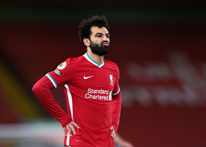 LIVERPOOL, ENGLAND - FEBRUARY 07: Mohamed Salah of Liverpool shows his frustration during the Premier League match between Liverpool and Manchester City at Anfield on February 07, 2021 in Liverpool, England. Sporting stadiums around the UK remain under strict restrictions due to the Coronavirus Pandemic as Government social distancing laws prohibit fans inside venues resulting in games being played behind closed doors. (Photo by Laurence Griffiths/Getty Images)