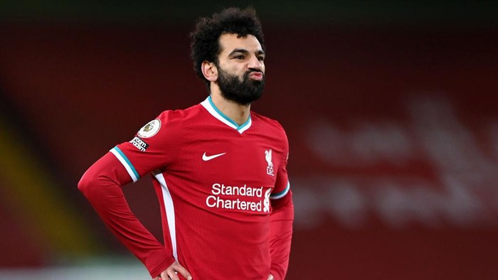 LIVERPOOL, ENGLAND - FEBRUARY 07: Mohamed Salah of Liverpool shows his frustration during the Premier League match between Liverpool and Manchester City at Anfield on February 07, 2021 in Liverpool, England. Sporting stadiums around the UK remain under strict restrictions due to the Coronavirus Pandemic as Government social distancing laws prohibit fans inside venues resulting in games being played behind closed doors. (Photo by Laurence Griffiths/Getty Images)