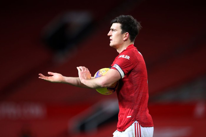 MANCHESTER, ENGLAND - FEBRUARY 06: Harry Maguire of Manchester United gestures to the assistant referee for a handball decision after Evertons third goal during the Premier League match between Manchester United and Everton at Old Trafford on February 06, 2021 in Manchester, England. Sporting stadiums around the UK remain under strict restrictions due to the Coronavirus Pandemic as Government social distancing laws prohibit fans inside venues resulting in games being played behind closed doors. (Photo by Alex Pantling/Getty Images)