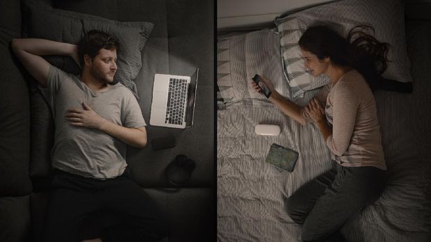 Couple talking by video conference.