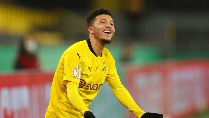 DORTMUND, GERMANY - FEBRUARY 02: Jadon Sancho of Borussia Dortmund reacts during the DFB Cup Round of Sixteen match between Borussia Dortmund and SC Paderborn 07 at Signal Iduna Park on February 02, 2021 in Dortmund, Germany. Sporting stadiums around Germany remain under strict restrictions due to the Coronavirus Pandemic as Government social distancing laws prohibit fans inside venues resulting in games being played behind closed doors. (Photo by Friedemann Vogel - Pool/Getty Images)