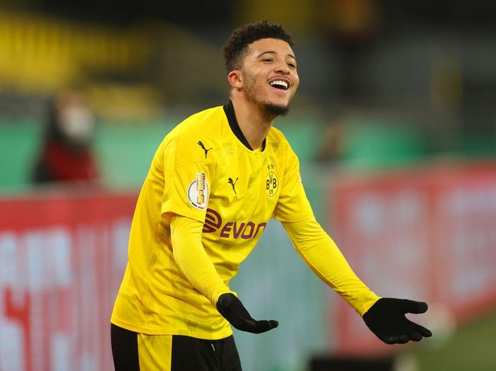 DORTMUND, GERMANY - FEBRUARY 02: Jadon Sancho of Borussia Dortmund reacts during the DFB Cup Round of Sixteen match between Borussia Dortmund and SC Paderborn 07 at Signal Iduna Park on February 02, 2021 in Dortmund, Germany. Sporting stadiums around Germany remain under strict restrictions due to the Coronavirus Pandemic as Government social distancing laws prohibit fans inside venues resulting in games being played behind closed doors. (Photo by Friedemann Vogel - Pool/Getty Images)