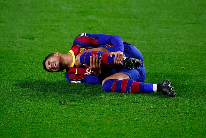 SEVILLE, SPAIN - FEBRUARY 07: Ronald Araujo of FC Barcelona reacts during the La Liga Santander match between Real Betis and FC Barcelona at Estadio Benito Villamarin on February 07, 2021 in Seville, Spain. Sporting stadiums around Spain remain under strict restrictions due to the Coronavirus Pandemic as Government social distancing laws prohibit fans inside venues resulting in games being played behind closed doors. (Photo by Fran Santiago/Getty Images)