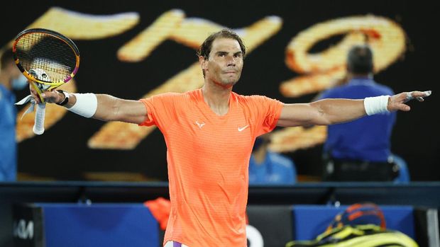 Spain's Rafael Nadal celebrates after defeating United States' Michael Mmoh during their second round match at the Australian Open tennis championship in Melbourne, Australia, Thursday, Feb. 11, 2021.(AP Photo/Rick Rycroft)