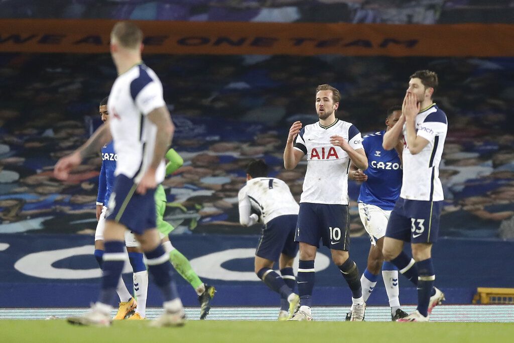 Tottenham's Harry Kane, center, reacts after a missed scoring opportunity during the English FA Cup 5th round soccer match between Everton and Tottenham Hotspur at Goodison Park, Liverpool, England, Wednesday, Feb. 10, 2021. (Martin Rickett/Pool via AP)