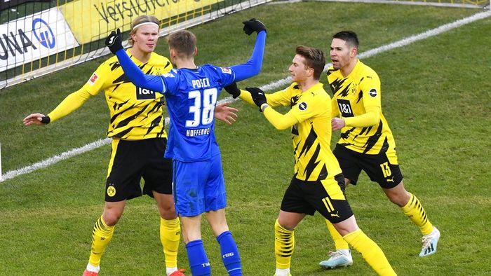 Germany Soccer Bundesliga Hoffenheims Stefan Posch argues with Dortmunds Erling Haaland, left, during the German Bundesliga soccer match between Borussia Dortmund and TSG 1899 Hoffenheim in Dortmund, Germany, Saturday, Feb. 13, 2021. (AP Photo/Martin Meissner, Pool)