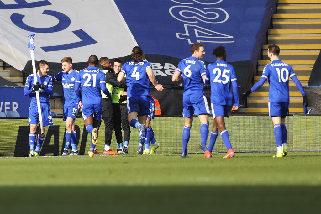 Leicester's Jamie Vardy, left, celebrates after scoring his side's second goal during the English Premier League soccer match between Leicester City and Liverpool at the King Power Stadium in Leicester, England, Saturday, Feb. 13, 2021. (Carl Recine/Pool Photo via AP)