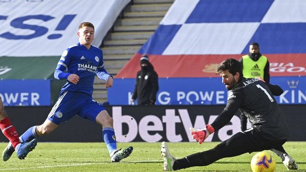 Leicester's Harvey Barnes, left, scores his side's third goal during the English Premier League soccer match between Leicester City and Liverpool at the King Power Stadium in Leicester, England, Saturday, Feb. 13, 2021. (Paul Ellis/Pool Photo via AP)