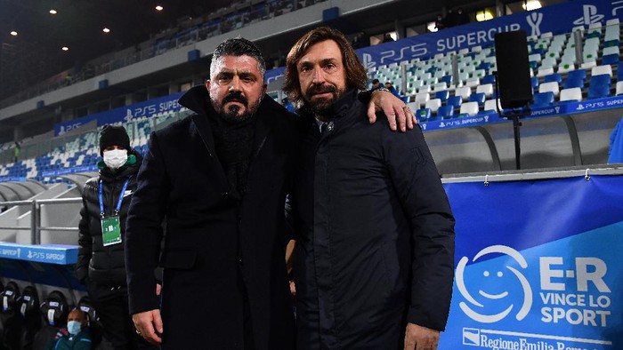 REGGIO NELLEMILIA, ITALY - JANUARY 20: Napoli Manager, Gennaro Gattuso (L) poses for a photo with Juventus Manager, Andrea Pirlo (R) prior to the Italian PS5 Supercup match between Juventus and SSC Napoli at Mapei Stadium - Citta del Tricolore on January 20, 2021 in Reggio nellEmilia, Italy. Sporting stadiums around Italy remain under strict restrictions due to the Coronavirus Pandemic as Government social distancing laws prohibit fans inside venues resulting in games being played behind closed doors. (Photo by Claudio Villa/Getty Images)