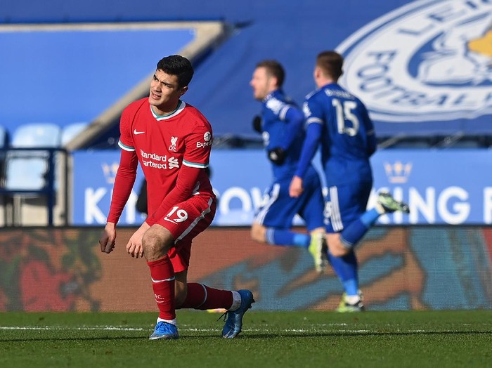 LEICESTER, ENGLAND - FEBRUARY 13: Ozan Kabak of Liverpool reacts after his team concede a second goal during the Premier League match between Leicester City and Liverpool at The King Power Stadium on February 13, 2021 in Leicester, England. Sporting stadiums around the UK remain under strict restrictions due to the Coronavirus Pandemic as Government social distancing laws prohibit fans inside venues resulting in games being played behind closed doors. (Photo by Michael Regan/Getty Images)