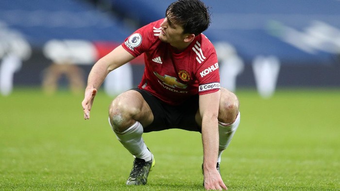 WEST BROMWICH, ENGLAND - FEBRUARY 14: Harry Maguire of Manchester United reacts at the full time whistle during the Premier League match between West Bromwich Albion and Manchester United at The Hawthorns on February 14, 2021 in West Bromwich, England. Sporting stadiums around the UK remain under strict restrictions due to the Coronavirus Pandemic as Government social distancing laws prohibit fans inside venues resulting in games being played behind closed doors. (Photo by Naomi Baker/Getty Images)
