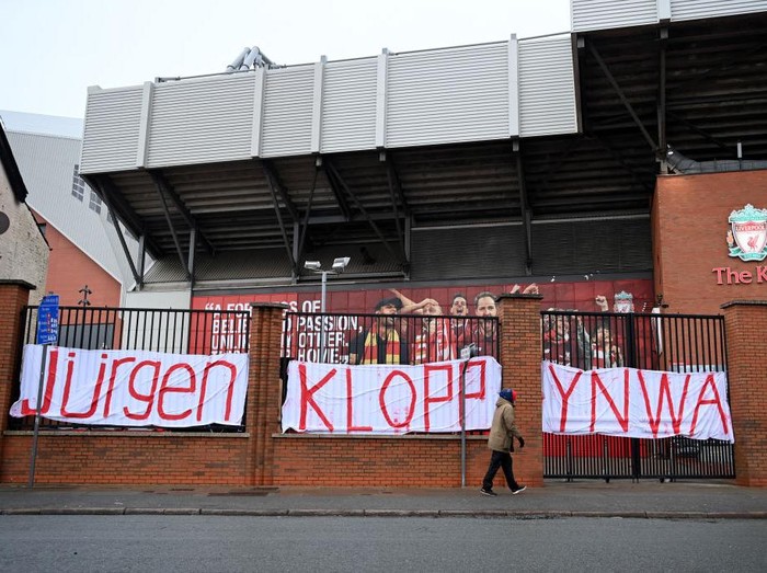 LIVERPOOL, ENGLAND - FEBRUARY 14: General view outside the stadium at Anfield as a sign is seen showing support for Liverpool manager Jugen Klopp on February 14, 2021 in Liverpool, England. (Photo by Michael Regan/Getty Images)