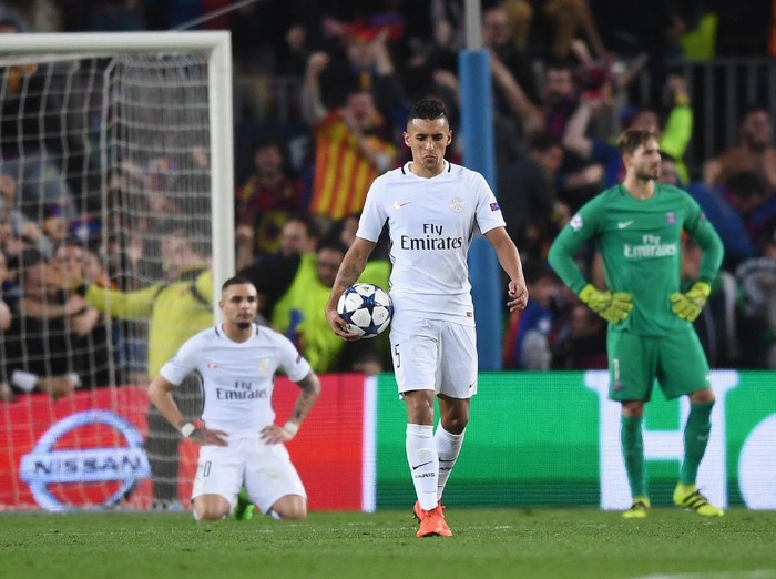 BARCELONA, SPAIN - MARCH 08: Marquinhos of PSG looks dejected after Barcelona's 6th goal during the UEFA Champions League Round of 16 second leg match between FC Barcelona and Paris Saint-Germain at Camp Nou on March 8, 2017 in Barcelona, Spain.  (Photo by Michael Regan/Getty Images)