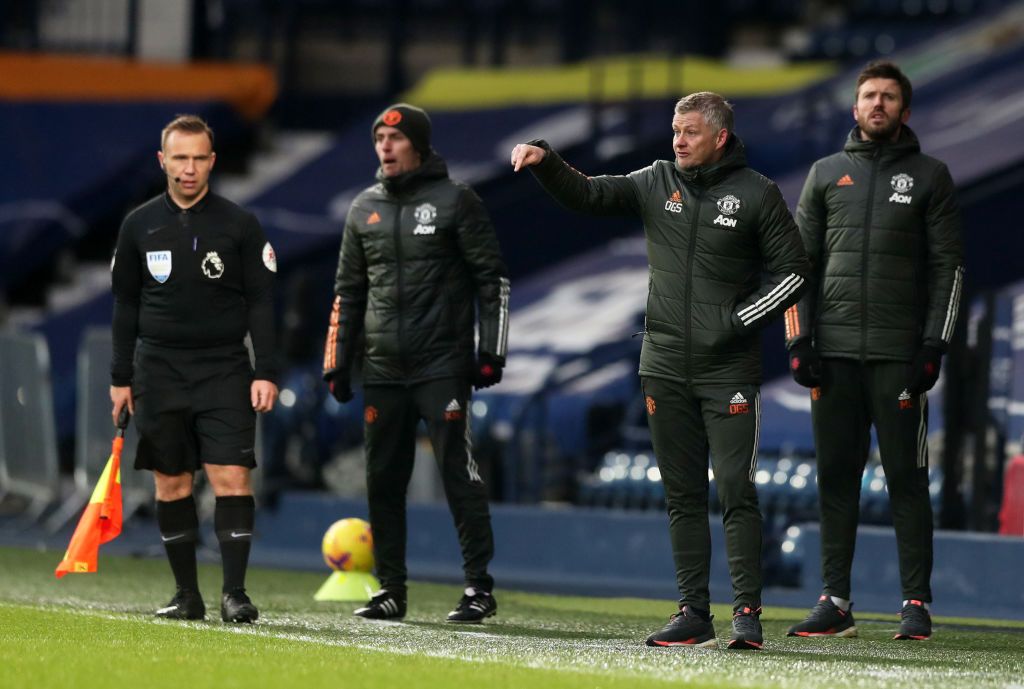 WEST BROMWICH, ENGLAND - FEBRUARY 14: Ole Gunnar Solskjaer, Manager of Manchester United gives his team instructions during the Premier League match between West Bromwich Albion and Manchester United at The Hawthorns on February 14, 2021 in West Bromwich, England. Sporting stadiums around the UK remain under strict restrictions due to the Coronavirus Pandemic as Government social distancing laws prohibit fans inside venues resulting in games being played behind closed doors. (Photo by Naomi Baker/Getty Images)