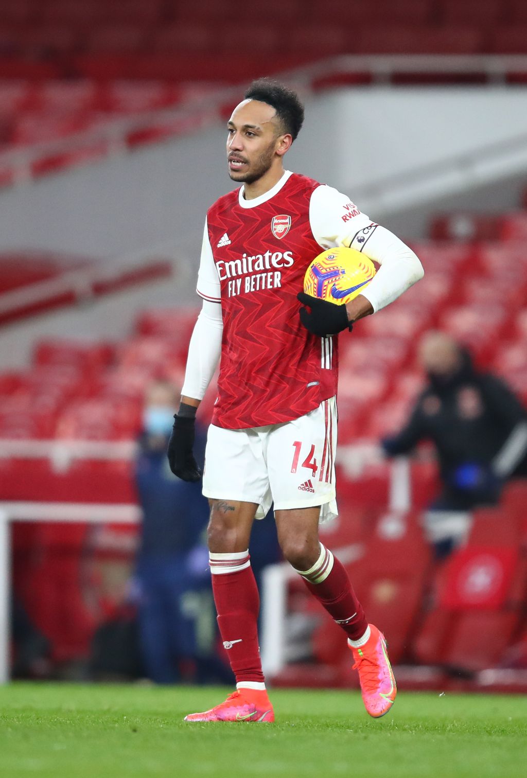 LONDON, ENGLAND - FEBRUARY 14: Pierre-Emerick Aubameyang of Arsenal claims the match ball after scoring a hat-trick during the Premier League match between Arsenal and Leeds United at Emirates Stadium on February 14, 2021 in London, England. Sporting stadiums around the UK remain under strict restrictions due to the Coronavirus Pandemic as Government social distancing laws prohibit fans inside venues resulting in games being played behind closed doors. (Photo by Julian Finney/Getty Images)