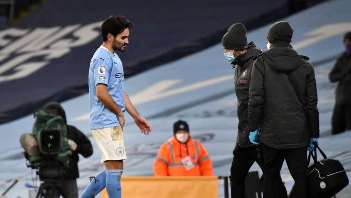 MANCHESTER, ENGLAND - FEBRUARY 13: Ilkay Gundogan of Manchester City reacts after being substituted during the Premier League match between Manchester City and Tottenham Hotspur at Etihad Stadium on February 13, 2021 in Manchester, England. Sporting stadiums around the UK remain under strict restrictions due to the Coronavirus Pandemic as Government social distancing laws prohibit fans inside venues resulting in games being played behind closed doors. (Photo by Rui Vieira - Pool/Getty Images)