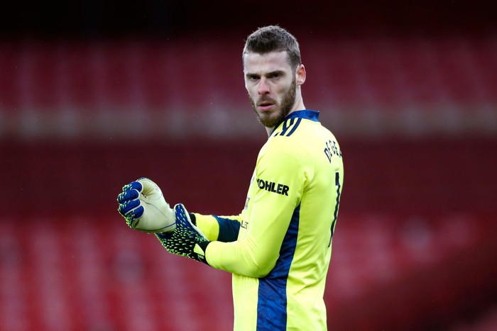 David De Gea LONDON, ENGLAND - JANUARY 30: David De Gea of Manchester United looks on prior to the Premier League match between Arsenal and Manchester United at Emirates Stadium on January 30, 2021 in London, England. Sporting stadiums around the UK remain under strict restrictions due to the Coronavirus Pandemic as Government social distancing laws prohibit fans inside venues resulting in games being played behind closed doors. (Photo by Alastair Grant - Pool/Getty Images)