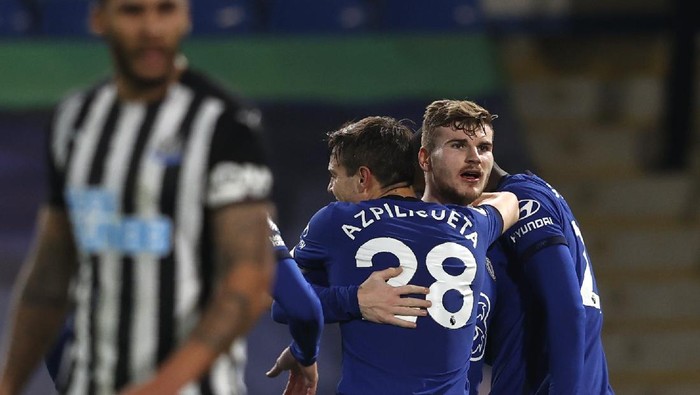 Chelseas Timo Werner celebrates after scoring his sides second goal during the English Premier League soccer match between Chelsea and Newcastle United at Stamford Bridge Stadium in London, England, Monday, Feb. 15, 2021. (Adrian Dennis/Pool via AP)