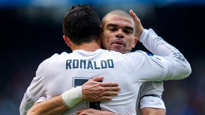 LA CORUNA, SPAIN - MAY 14:  Cristiano Ronaldo of Real Madrid celebrates with his teammate Pepe of Real Madrid after scoring the opening goal during the La Liga match between RC Deportivo La Coruna and Real Madrid CF at Riazor Stadium on May 14, 2016 in La Coruna, Spain.  (Photo by Juan Manuel Serrano Arce/Getty Images)