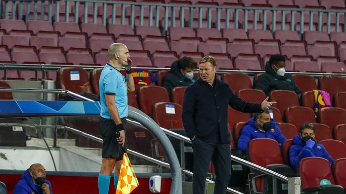 Ronald Koeman Barcelonas head coach Ronald Koeman gestures during the Champions League round of 16, first leg soccer match between FC Barcelona and Paris Saint-Germain at the Camp Nou stadium in Barcelona, Spain, Tuesday, Feb. 16, 2021. (AP Photo/Joan Monfort)