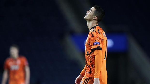 Juventus' Cristiano Ronaldo reacts during the Champions League round of 16, first leg, soccer match between FC Porto and Juventus at the Dragao stadium in Porto, Portugal, Wednesday, Feb. 17, 2021. (AP Photo/Luis Vieira)