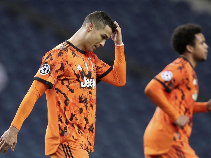Juventus' Cristiano Ronaldo reacts during the Champions League round of 16, first leg, soccer match between FC Porto and Juventus at the Dragao stadium in Porto, Portugal, Wednesday, Feb. 17, 2021. (AP Photo/Luis Vieira)