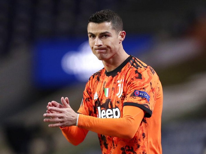 Juventus' Cristiano Ronaldo reacts during the Champions League round of 16, first leg, soccer match between FC Porto and Juventus at the Dragao stadium in Porto, Portugal, Wednesday, Feb. 17, 2021. (AP Photo/Luis Vieira)